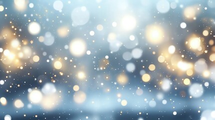 Obraz premium Golden and white bokeh lights drift gently against a cool blue gradient winter holiday background.