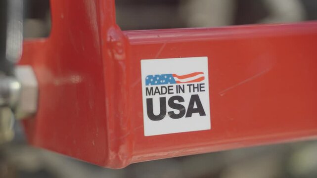 Closeup shot of made in usa label pasted on machine.