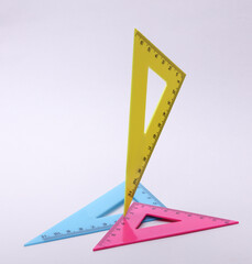 Rulers triangles on a white background