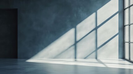 Fototapeta premium Modern empty interior space with large window casting shadows on concrete walls and floor Copy Space