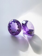 Fototapeta premium Purple gems on white surface