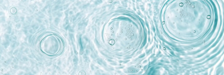 Ripples in clear blue water with abstract circular patterns, suitable as calming SPA background