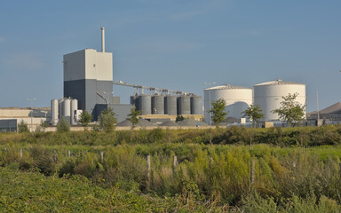 Cement factory on a sunny day in the port of Ghent, Flanders, Belgium 
