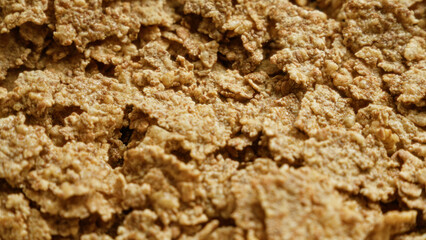 Closeup of cornflakes texture showcasing breakfast cereal food in a detailed and crunchy manner capturing an essential morning meal staple
