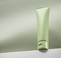 Simple, elegant green tube mockup, copy space