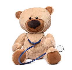Pediatrics concept. Teddy bear with stethoscope isolated on white