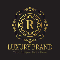 Luxury Ornate Letter Logo with Circular Frame and Dots