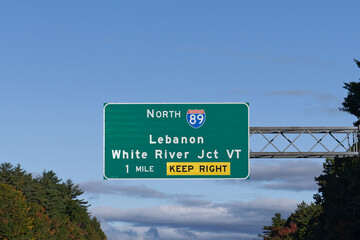 highway exit sign in Bow, New Hampshire on Interstate 93 for Interstate 89 North toward Lebanon, New Hampshire and White River Junction, Vermont