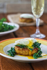 crab cake benedict with sautéed spinach