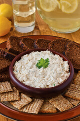 creamy crab dip served with pumpernickel bread and crackers