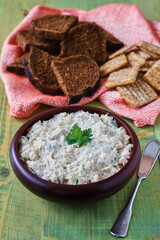 creamy crab dip served with pumpernickel bread and crackers