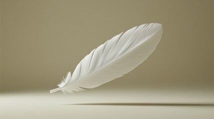 Single white feather floating gently on beige background.