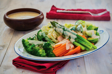 mixed vegetables, steamed and topped with a cheese sauce
