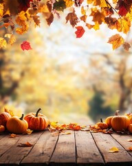 Autumn pumpkins and leaves on wooden table