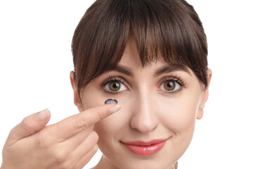 Fototapeta premium Woman with blue color contact lens on white background, closeup