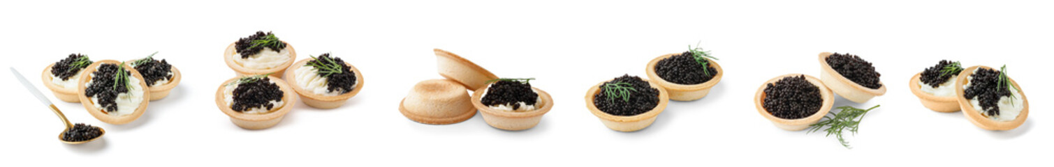 Set of tartlets with black caviar on white background