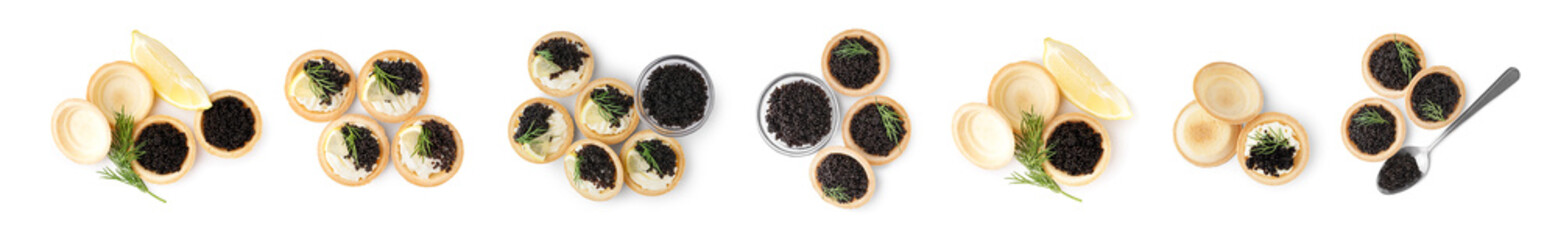 Set of tartlets with black caviar on white background, top view