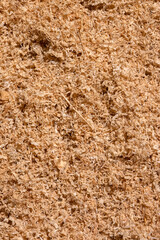 Pile of assorted wood sawdust for use as a background backdrop. Eco biodegradable material