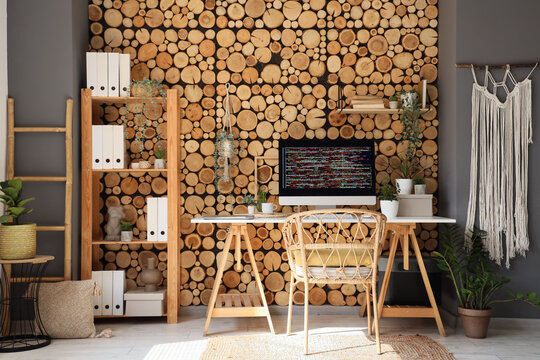 Stylish workplace of programmer with modern computer in light office