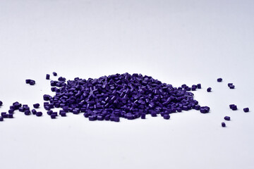 Isolated blue masterbatch granules on white background,color pigment carrier polymer in plastic...