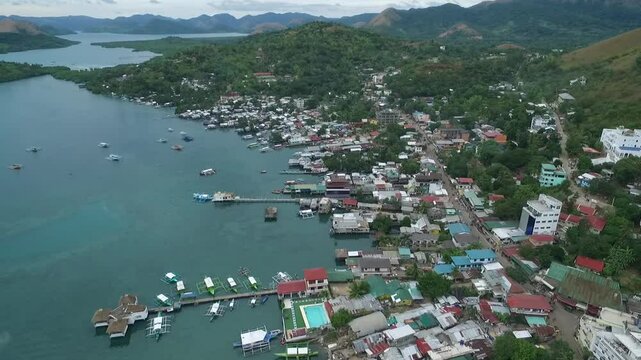 Coron Cityscape with Sulu Sea in Background. Palawan, Philippines. Local Architecure and Seashore in Background. Drone