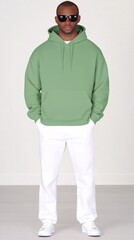 Fototapeta premium mockup of a plain dark green hoodie on a man, ideal for branding and design.
