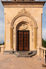Doors with religious images in the Christian Orthodox Church of the Holy Trinity