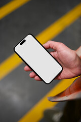  Smartphone mockup in hand person is holding a phone parking view