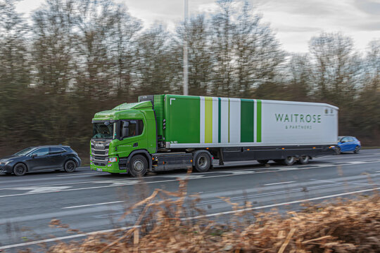 Lorry belonging to the British Waitrose Supermakret in motion on the motorwey M1
