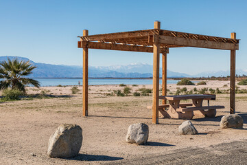 Mecca, California, USA. Shade shelter at a picnic area on the Salton Sea.