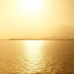 Naklejka premium Golden Sunset over Calm Sea and Distant Mountains