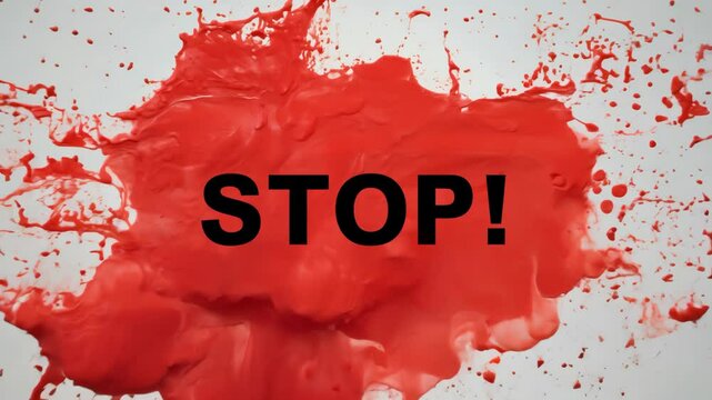 A red splatter of paint with the word STOP written in black. The splatter is on a white background