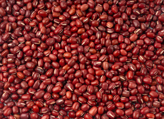 Red adzuki beans texture background, raw aduki bean pattern, Vigna angularis legume seeds