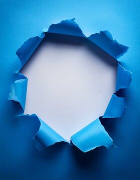 Blue torn sheet of paper with whole space for text