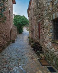 stone houses and streets with trees siruana tarragona spain