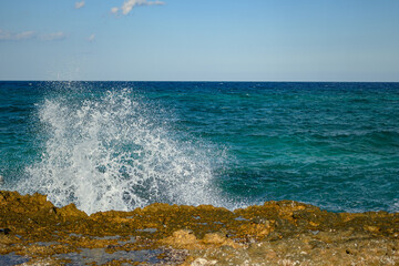 Splashing Ocean Waves on Rocky Coastline