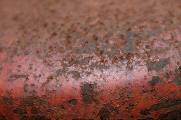 Rusty surface reveals stories of time and elements in an abandoned industrial setting