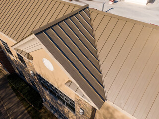 Sunny Day Time Drone Images of Standing Seam Metal Roof on a Commercial Building Also Featuring...