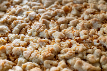 Streusel eines Kuchens als Hintergrund oder Textur