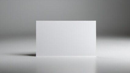 Silver metallic card template with a modern touch, placed on a plain surface.