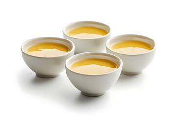 Three bowls with mustard sauce isolated on a white background