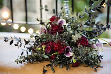 Beautiful rose wedding bouquet at reception