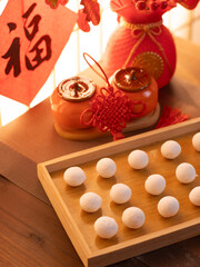 sweet dumping or tangyuan traditional Chinese new year food .(the Chinese characters means New Year's blessing）