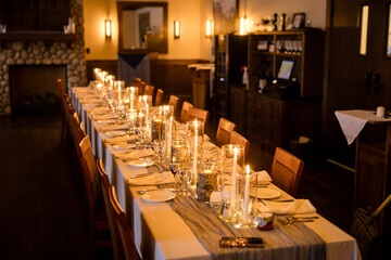 Elegant candlelit banquet hall decorated for a wedding reception