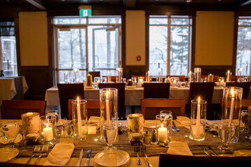 Elegant candlelit banquet hall decorated for a wedding reception