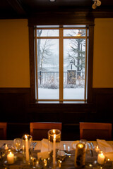 Elegant candlelit banquet hall decorated for a wedding reception