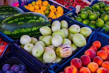 many, colorful, delicious fruits packed in boxes outside at a stall in Turkey Beldibi, Kemer, Antalya