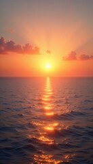 Fototapeta premium Vibrant sunset over calm ocean waters, symbolizing life reset and new beginnings