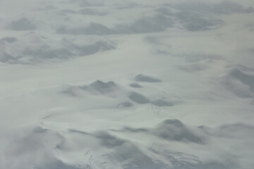 Foggy aerial view of Antarctica landscape.