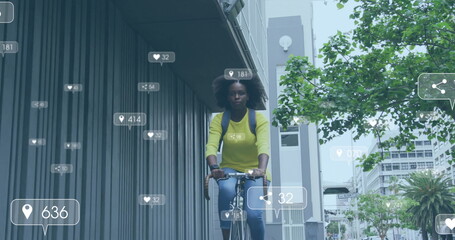 Image of icons and data processing over african american woman riding bike